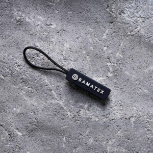 En zipper, draghjälp, dragkedjehänge till ryggsäck, bag eller väska.