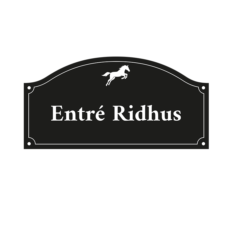 Valvformad plakett med texten entré ridhus. Lasergraverad text i vitt. storlek 225x112 mm, monteras med skruv alternativt dubbelhäftande tejp.
